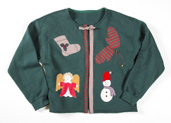 green sweater with stocking, angel, snowman, mittens